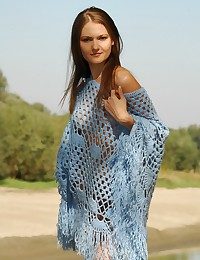 Charming model with sensual and subtly erotic poses.